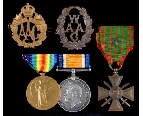 WORLD WAR ONE PAIR British War Medal and Victory Medal 3905 WKR E M HARVEY QMAAC, two cap badges, notice, forms and several o