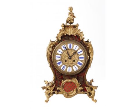 A FRENCH ORMOLU MOUNTED CUT BRASS INLAID, RED STAINED HORN AND EBONISED 'BOULLE' CLOCK, LATE 19TH C  striking on a bell, 44cm