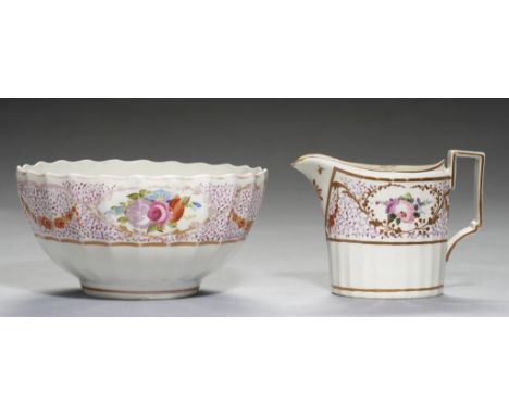 A PINXTON FLUTED OVAL CREAM JUG AND SLOP BASIN, 1796-1813  pattern 245, painted in polychrome with oval floral medallions on 