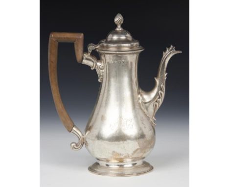 A GEORGE III SILVER COFFEE POT 25cm h, by Walter Brind, London 1769, the underside engraved with contemporary initials B/R*I,