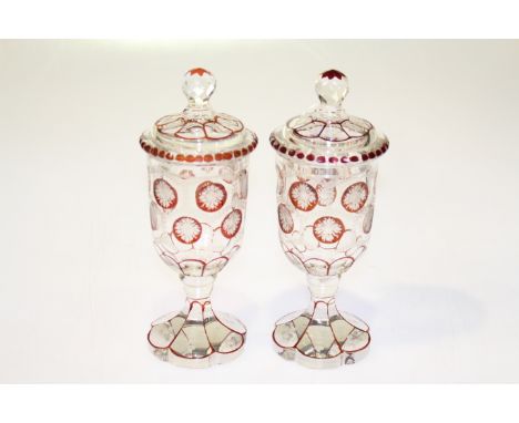 Pair of Bohemian ruby and etched glass vases and covers