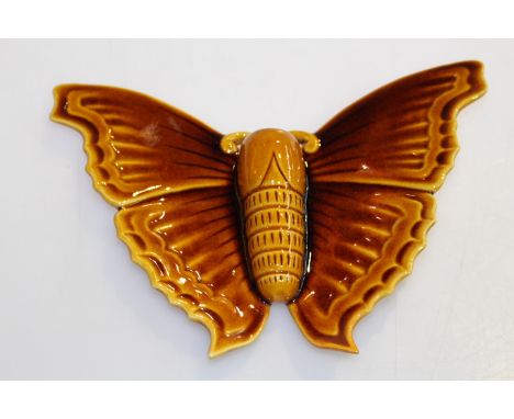 Linthorpe pottery treacle glazed butterfly wall vase, no. 1745