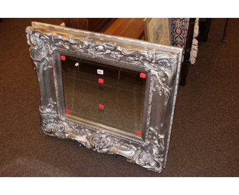 Period style mirror with silvered frame