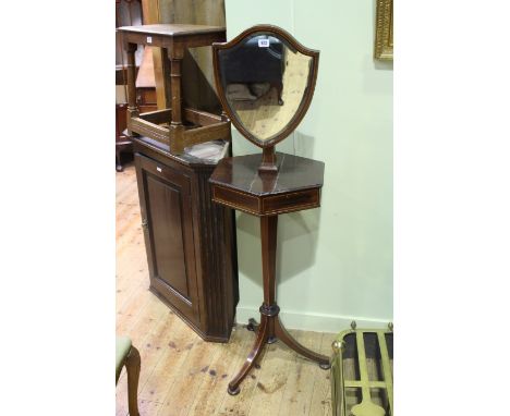 Late 19th Century mahogany and satinwood shaving stand having shield shaped adjustable mirror above a double hinged compartme