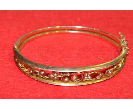 9ct gold and seed pearl bangle
