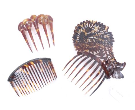 Three early 20th century ladies tortoiseshell headpieces. Comprising a large scrolled example with pierced and etched decorat