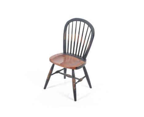 A 20th century miniature apprentice or tradesman's sample Windsor stick back chair. Ebonised wooden frame, shaped seat, four 