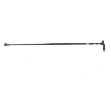 A Victorian ebony silver top and collared walking stick. Hallmarked Birmingham 1899, with scrolling decoration, L84cm