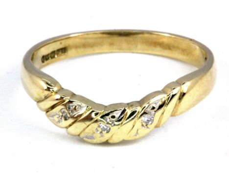 A 9ct yellow gold diamond set ring, (L).