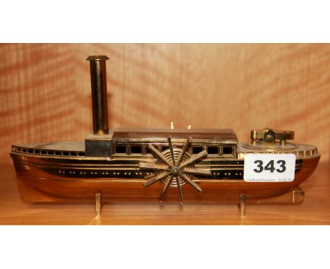 A vintage gilt metal paddle steamer table lighter, L. 24cm.
