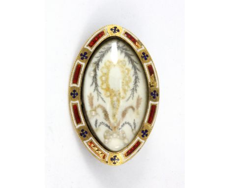 A Victorian yellow metal (tested 9ct gold) enamelled brooch, 4.5 x 2.5cm.