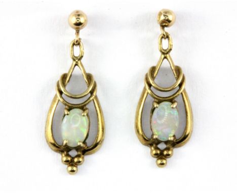 A pair of 9ct yellow gold opal set earrings, L. 2.5cm.
