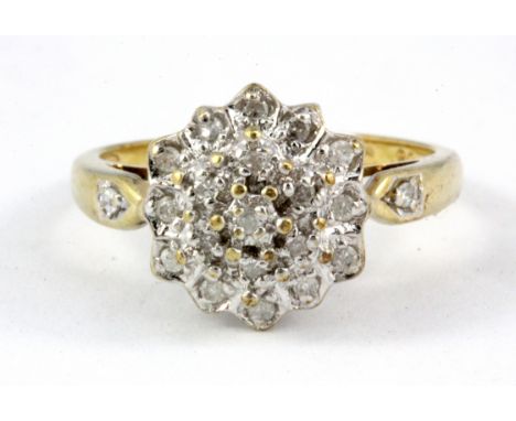 A 9ct yellow gold diamond set cluster ring, (P).