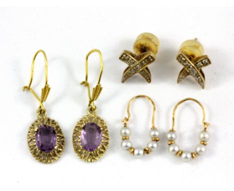 Three pairs of 9ct yellow gold earrings.