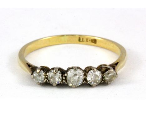 An 18ct yellow gold five diamond set ring, (N).