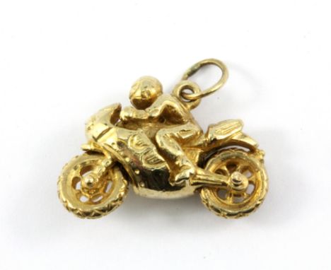 A 9ct yellow gold motorbike shaped pendant, L. 3cm.