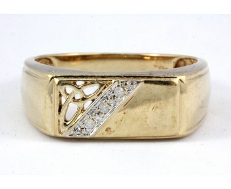 A gentleman's 9ct yellow gold diamond set signet, (V).