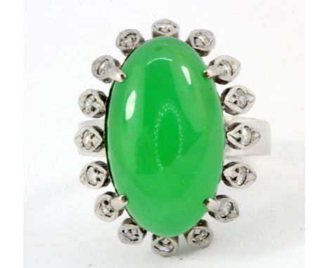 A boxed 18ct white gold (stamped 18k) nephrite jade and diamond set ring, (K).