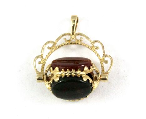 A 9ct yellow gold stone set spinning fob, L. 2.2cm.
