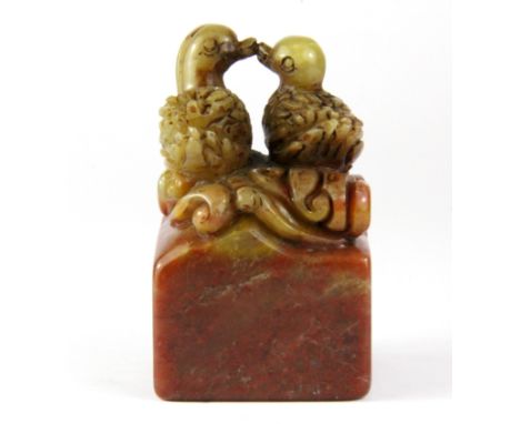 A mid 20th Century Chinese carved soapstone scholars seal mounted with a pair of Mandarin ducks, H. 7.5cm.