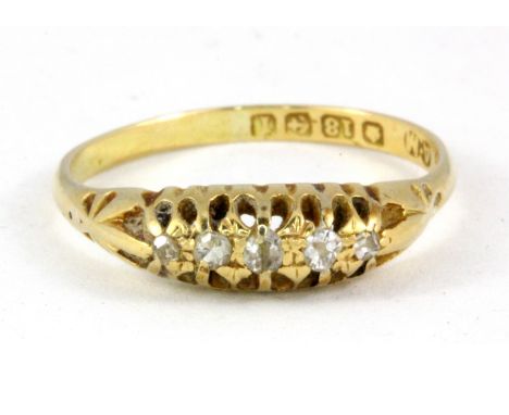 An 18ct yellow gold diamond set antique ring, (P.5).