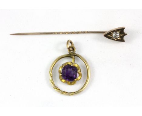 A yellow metal (tested minimum 9ct gold) amethyst set pendant and a yellow metal (tested minimum 9ct gold) stone set stick pi