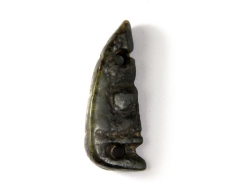 A Chinese carved archaic form jade head amulet, H 6.5cm.