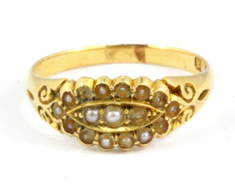 An 18ct yellow gold pearl set cluster ring, (N.5).