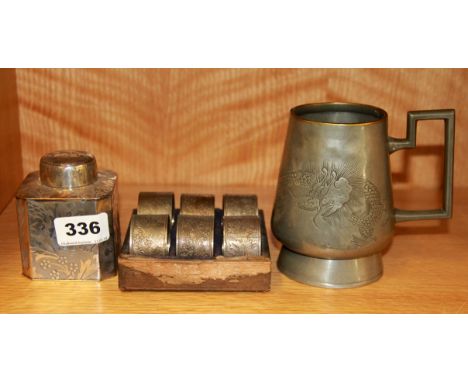 A set of six silver plated napkin rings, a Chinese silver plated tea caddy and a Chinese pewter tankard, tankard H. 12cm.