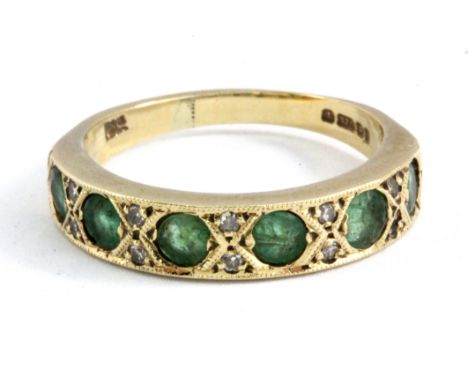 A 9ct yellow gold emerald and diamond set ring, (R).