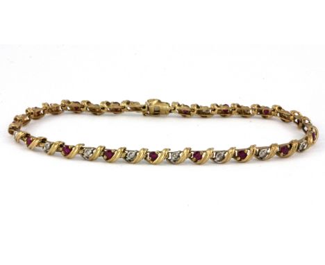 A 9ct yellow gold ruby and diamond set bracelet.