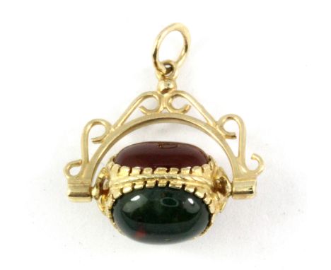 A 9ct yellow gold stone set spinning fob, L. 2.5cm.