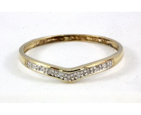 A 9ct yellow gold diamond set wishbone ring, (O.5).