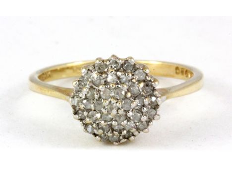 A 9ct yellow gold diamond set cluster ring, (N.5).