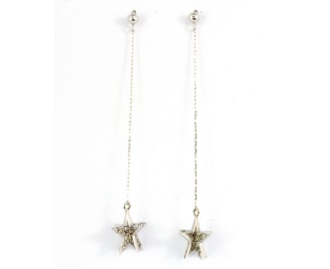 A pair of 18ct white gold diamond set star drop earrings, L. 5cm. (replaced butterflies).