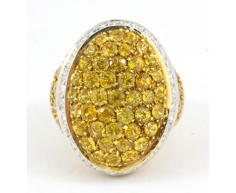 A fabulous hand made 18ct yellow gold ring set with approc 1ct and diamonds and 6ct yellow sapphires, with makers certificate