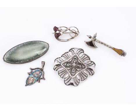 A WMF Ikora white meal pierced brooch, with open work design 4.5 cm, together with an oval Ruskin style, Kensington C &amp; L