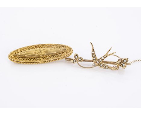 A 9ct gold diamond and seed pearl swallow bird bar brooch, with diamond set head of bird, one seed pearl missing 4.2 cm long 