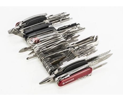 A modern Wenger Giant Swiss Army knife, in presentation box, the 83 tool and bladed pocket knife being 24cm wide and weighing