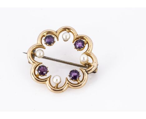 A cultured pearl and amethyst wreath brooch, marked 15ct, 2.5 cm diameter 3.3g 