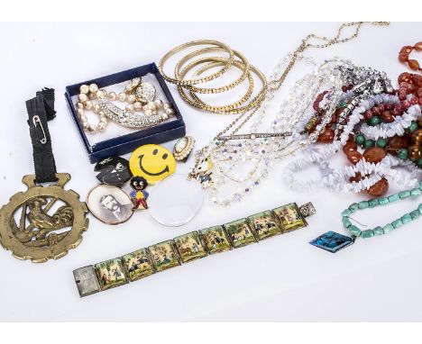 A collection of hardstone beads and other items, including a Trifari necklace and clip earrings, a Mother of Pearl Persian br