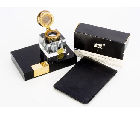 A modern Montblanc inkwell, together with a Montblanc black leather notepad holder and a bottle of ink