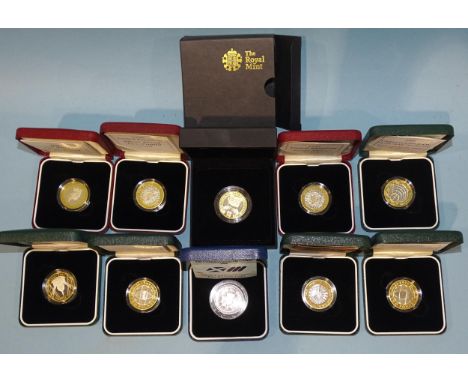 The Royal Mint, a collection of ten cased silver proof £2 coins, comprising: 1997 (x2), 1998, 1999 Rugby World Cup (x2), 2001