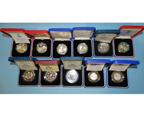 The Royal Mint, a collection of eleven cased silver proof commemorative crowns/£5 coins, comprising: 1990 The Queen Mother's 