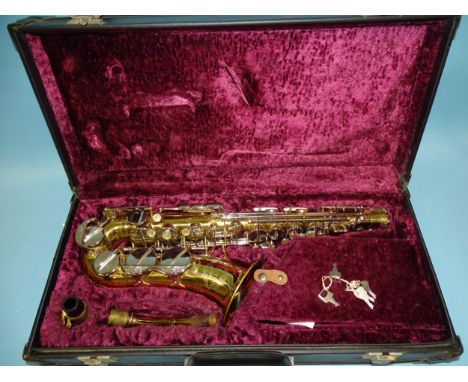 A "Corton" by Amati brass saxophone numbered 190839, with fitted case.