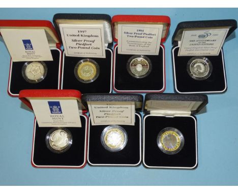 The Royal Mint, a collection of seven cased silver proof Piedfort £2 coins, comprising: 1994 Bank of England, 1995 United Nat
