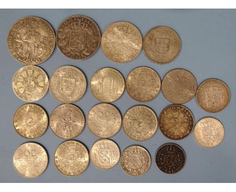 A collection of World silver coinage, including an Austria restrike 1486 Guldiner, ten 2-schilling 1927-1936, twenty-five sch