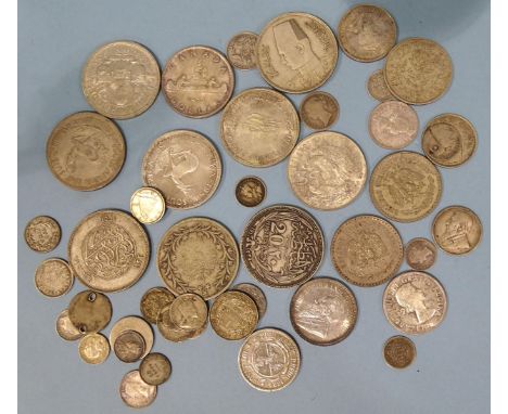 A collection of various World silver and white metal coinage, total weight 437g.