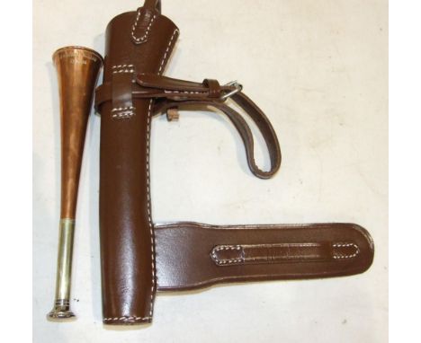 A copper hunting horn engraved H Y Keat, Sutton Scotney, 22cm, in well-made reproduction leather holster.
