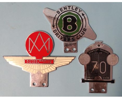 An Aston Martin Owners Club enamel car badge, a Bentley Drivers Club car badge and a Bentley Drivers Club 70-year celebration